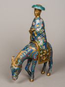 A 19th century Chinese cloisonne censer Formed as a figure mounted on horseback,