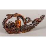 A Chinese carved horn model of a boat Modelled as foliate specimens,