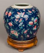A 19th century Chinese porcelain ginger jar Decorated with brightly enamelled butterflies,