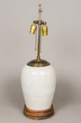 A Chinese pottery crackle glaze lamp Of ovoid vase form with a white crackle glaze with brass lamp