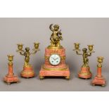 A patinated and gilt bronze mounted rouge marble five piece clock garniture The clock of cut