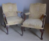 A pair of 18th century style upholstered open armchairs Each with padded back above twin padded
