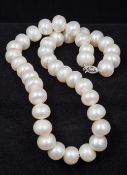 A pearl bead necklace The clasp marked 14K. Approximately 41 cm long.