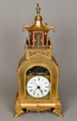 A Chinese gilt metal cased automaton table clock The 6 inch white painted dial with Roman numerals