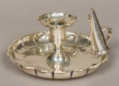 A George III silver candle snuffer, hallmarked London 1811,
