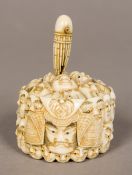 A Japanese Meiji period ivory box and cover Of small proportions,
