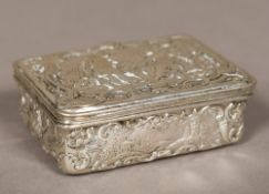 A 19th century Continental silver snuff box, bearing indistinct marks Of hinged rectangular form,