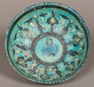 An early antique Persian pottery bowl The interior decorated with scrolling motifs and calligraphy,