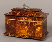 A 19th century tortoiseshell tea caddy Of shaped rectangular form,