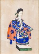 A late 19th century Chinese rice paper painting of an Empress Seated in traditional costume,