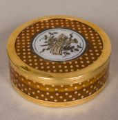 A George III unmarked gold mounted tortoiseshell box and cover Of circular section,