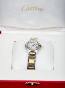 A lady's Cartier Ballon Bleu Stainless steel cased wristwatch The signed silvered dial with Roman