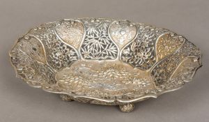 A Chinese silver basket, maker's mark of IG Of pierced lobed form,