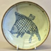 A Chinese Provincial porcelain dish Decorated with a carp. 17.5 cm diameter.