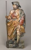 A 19th century polychrome painted carved wooden model of St Roch Of flat back form,