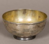 A Chinese silver bowl, the underside marker's mark of KW Of footed circular form,