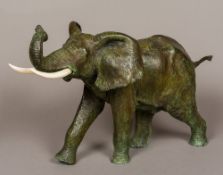 A large late 19th/early 20th century patinated bronze animalier sculpture Formed as an elephant