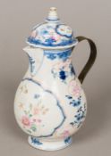 An 18th century Chinese Export porcelain coffee pot and cover Decorated with floral sprays and an
