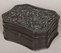 A 19th century Anglo-Ceylonese carved ebony box Of serpentine rectangular form,