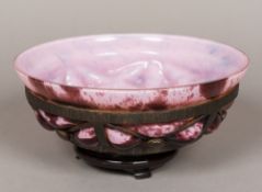 A Daum-Majorelle wrought metal mounted blown glass dish The glass mottled purples, unsigned.