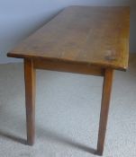 A 19th century French fruitwood farmhouse table The rectangular plank top above the plain frieze