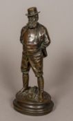 A 19th century patinated bronze figure Model as a bearded English country gentleman,