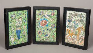 Three antique Qajar tiles Each of rectangular form, two decorated with figures, one on horseback,