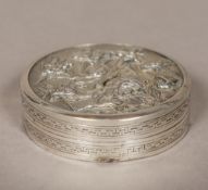 An unmarked Chinese silver box and cover Of circular section,