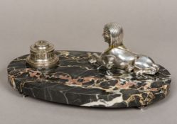 GEORGE GUESNET (19th/20th century) French A silvered bronzed mounted variegated black marble desk
