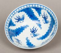 A Chinese blue and white porcelain bowl The interior worked with goldfish interspersed with aquatic