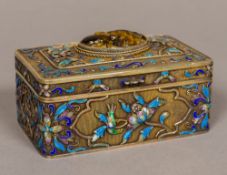 A Chinese enamel decorated silver box Of hinged rectangular form,