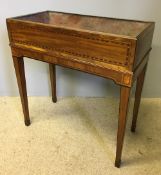 A late 18th/early 19th century inlaid mahogany jardiniere Of rectangular form with removable liner,