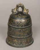 A 19th century Sino-Tibetan bronze bell The top surmounted with a twin headed mythical beast