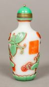 A Chinese Peking glass snuff bottle Decorated in the round with butterflies and a four character