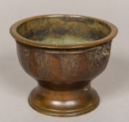A 19th century Chinese patinated bronze censer Of footed circular form,