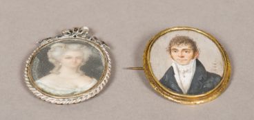 A late 18th/early 19th century miniature portrait on ivory depicting a gentleman wearing a white