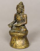 A Sino-Tibetan bronze figure of seated Buddha Typically worked. 9 cm high.