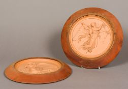 A pair of 19th century terracotta plaques Each formed as a classical angel motif,