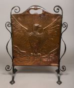 A Continental turn of the century copper and wrought iron fire screen,