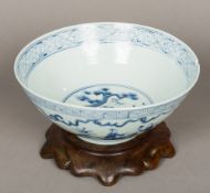 A Chinese blue and white porcelain bowl The exterior decorated in the round with figures in a