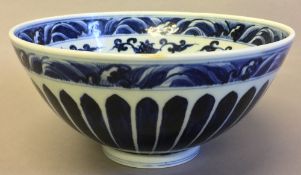 A Chinese blue and white porcelain bowl The exterior with a lappet band,