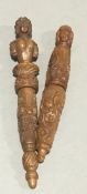 A pair of 18th century carved coquilla nut needle cases