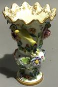 A Spode porcelain flower encrusted pedestal vase, circa 1830,