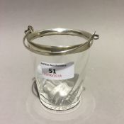A silver mounted glass ice cube pail,