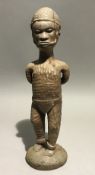 An African wood carving of a slave