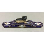 A 19th century Continental porcelain dog form paper weight,