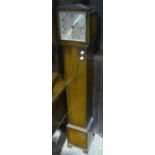 An oak cased Grandmother clock