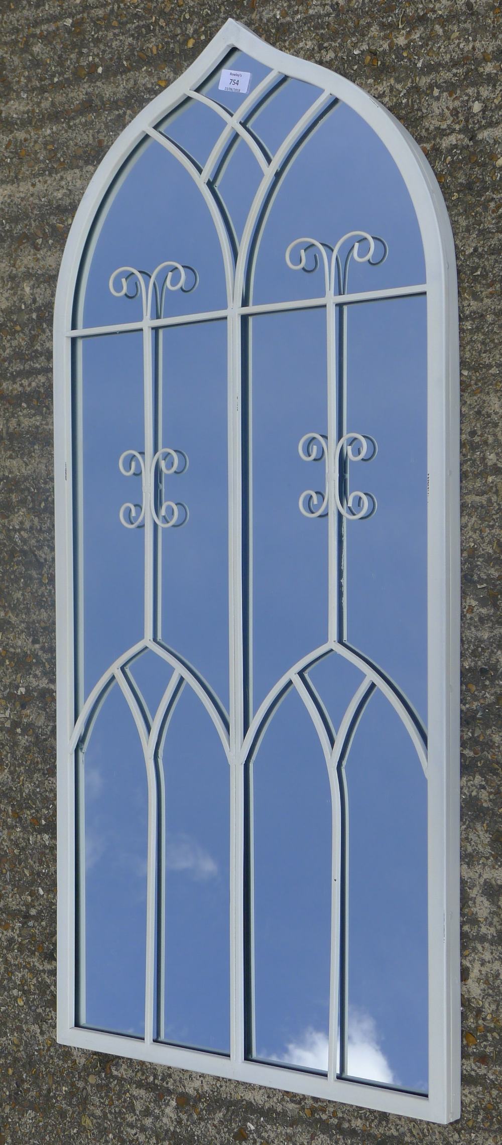 A white iron gothic mirror