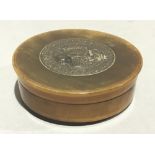 A 19th century pressed horn snuff box