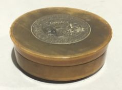 A 19th century pressed horn snuff box